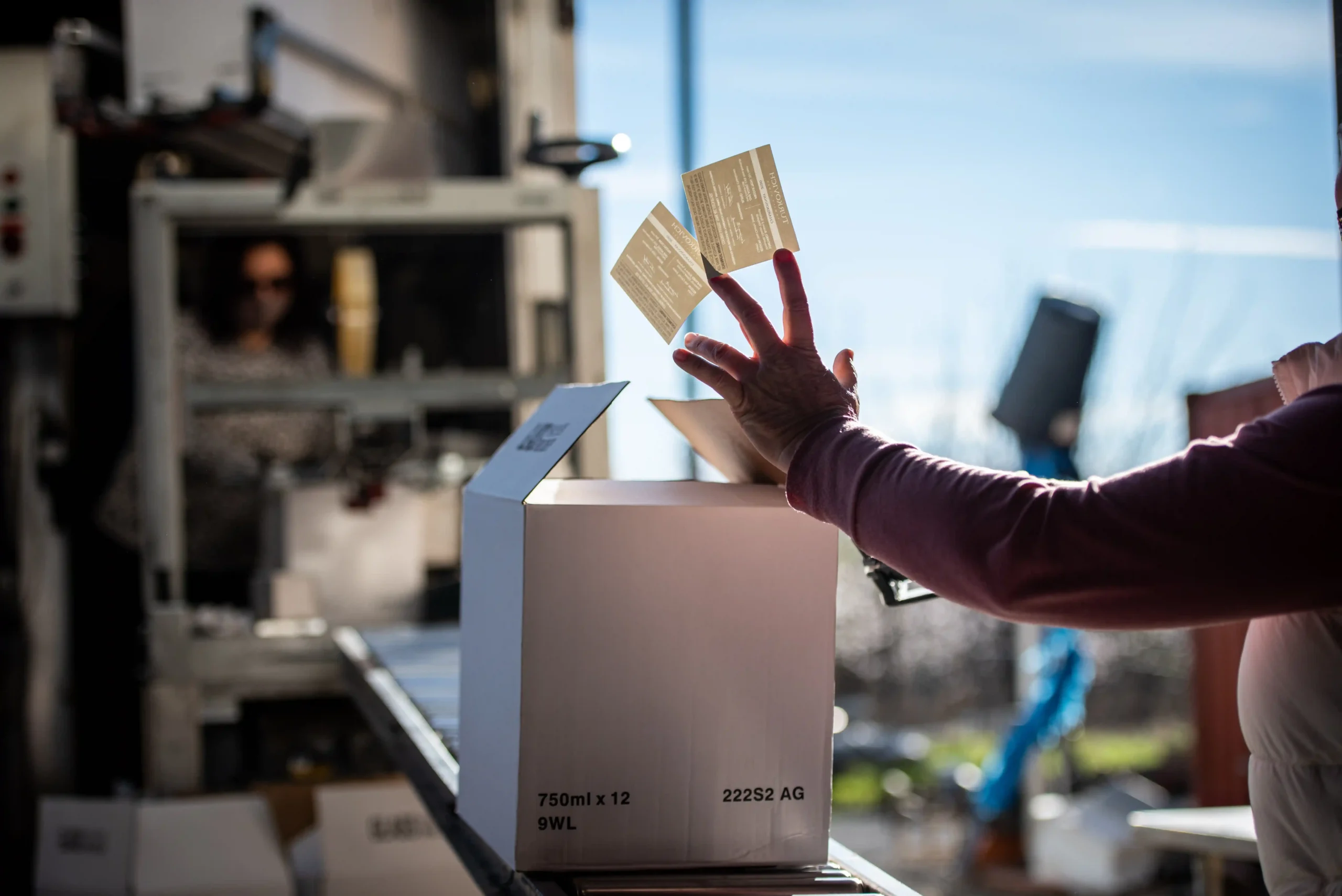 Hand-finishing Bitcoin wine bottles final quality control cryptocurrency winery Turkovich California artisan