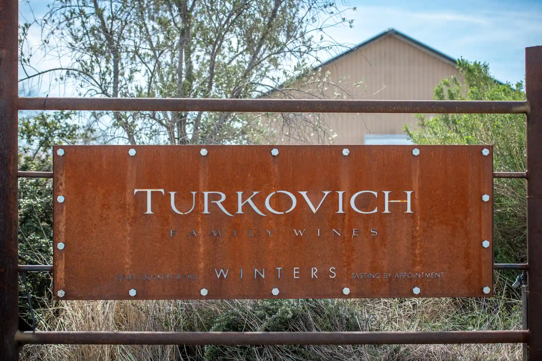 Turkovich Family Wines entrance sign Americas first Bitcoin winery Winters California wine country destination